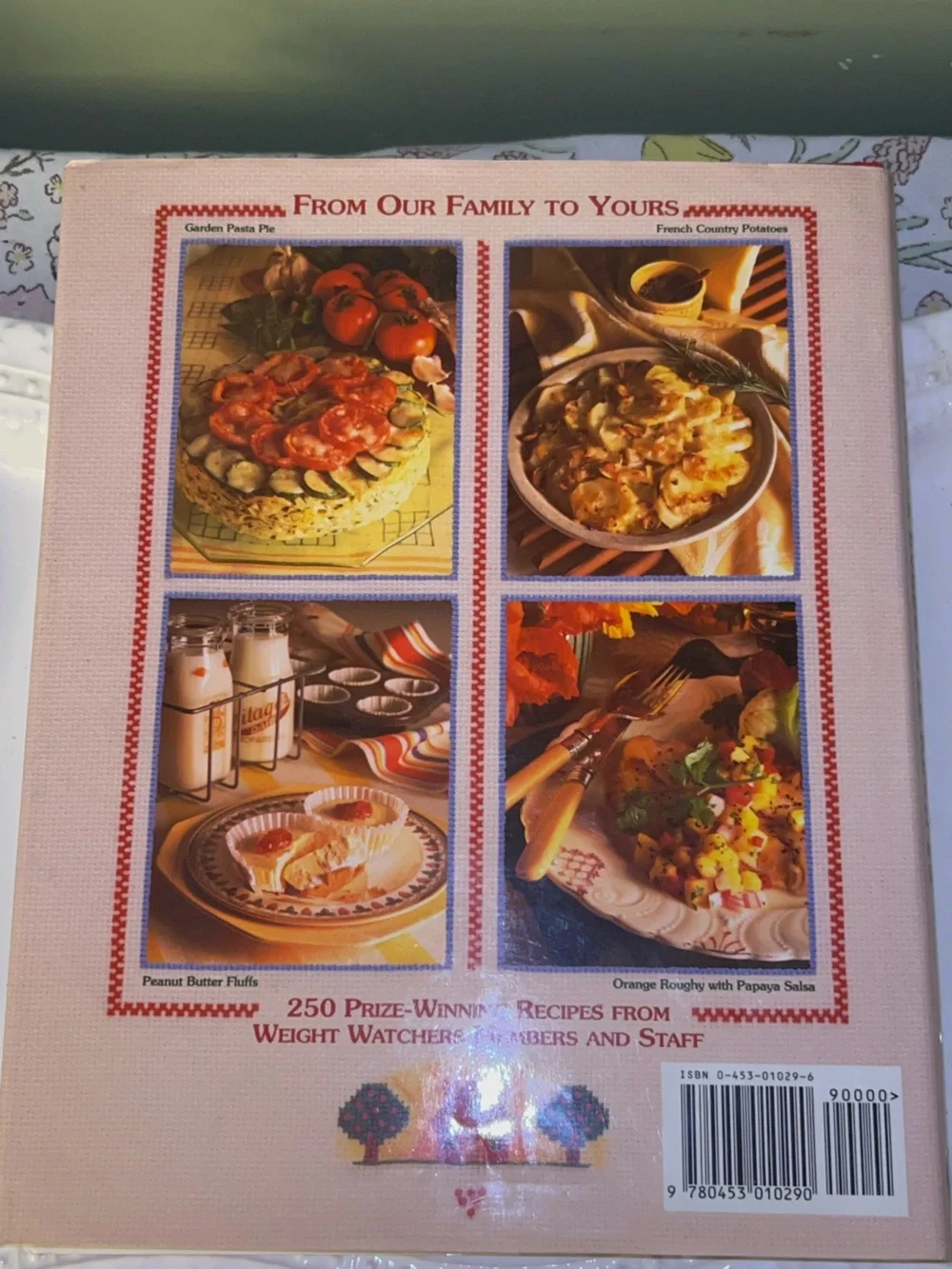 Vintage 1993 hardcover cookbook titled Weight Watchers Favorite Homestyle Recipe
